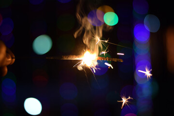 ISOLATED CRACKER SPARKLE WITH BOKEH 
