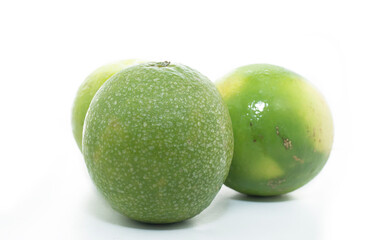 Closeup of Green and yellow Color Mosambi or Sweet lime Fruit isolated on White Background