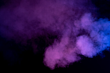 Naklejka na ściany i meble Abstract smoke over the black background. Smoke background. Smoke movement on black background