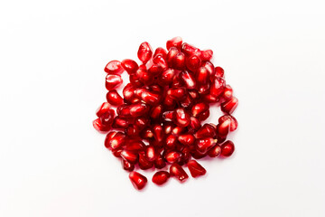 Pomegranate fruit on a white background. Vitamins for health during a pandemic. Protection from coronavirus.