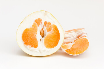 Pomelo fruit on a white background. Source of vitamin C and prevention during the coronavirus pandemic.