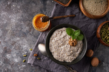 Healthy breakfast, seed and nut mix with honey and mint