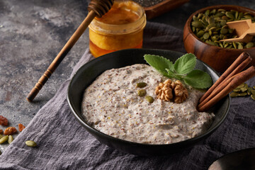 Healthy breakfast, seed and nut mix with honey and mint