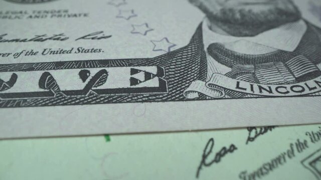 Macro many 5 american dollar bills. Cash money banknotes. Linkoln face texture. Finance and investment concept. Closeup shot. Currency exchange of one hundred usd. Rich business economy of usa