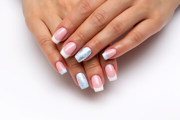 French manicure with white, light blue and silver matte nail on long square nails close-up on a white background. - obrazy, fototapety, plakaty