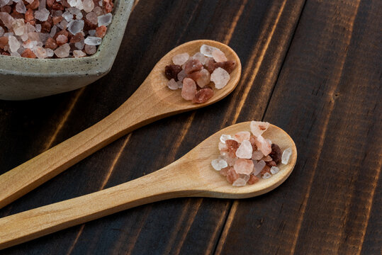 Shooting pink rock salt on wooden spoons
