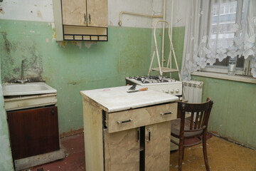 Interior of an old dirty kitchen. Preparing for repairs