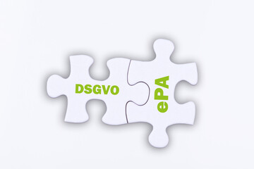 Puzzle Teile mit der Aufschrift DSGVO und ePA