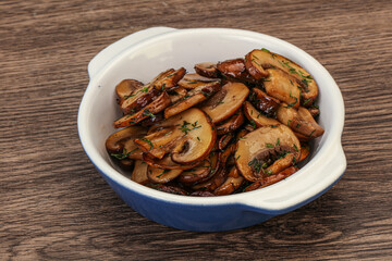 Roasted champignon with herbs and spices