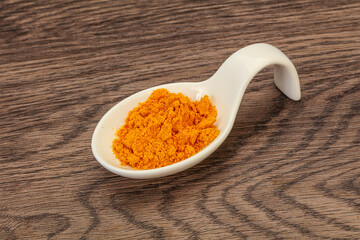 Tumeric powder in the bowl