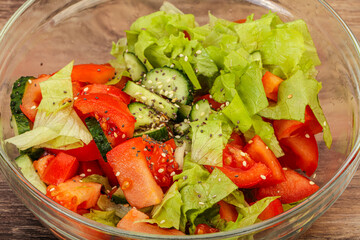 Vegan salad with tomato, cucumber and chia