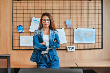 Attractive business woman in glasses in office