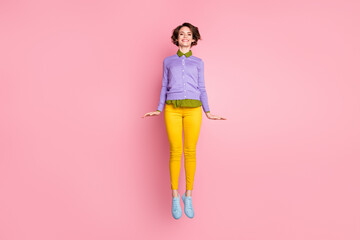 Full size photo of pretty charming girl jump wear good look gumshoes isolated over pink color background
