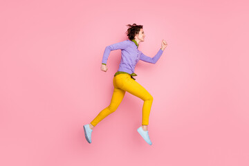 Fototapeta na wymiar Full body profile side photo of girl jump run discounts wear purple sneakers isolated pastel color background