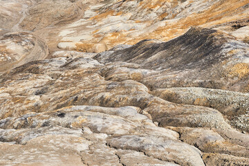 ravine in a clay land devoid of soil soil at an open pit mining site