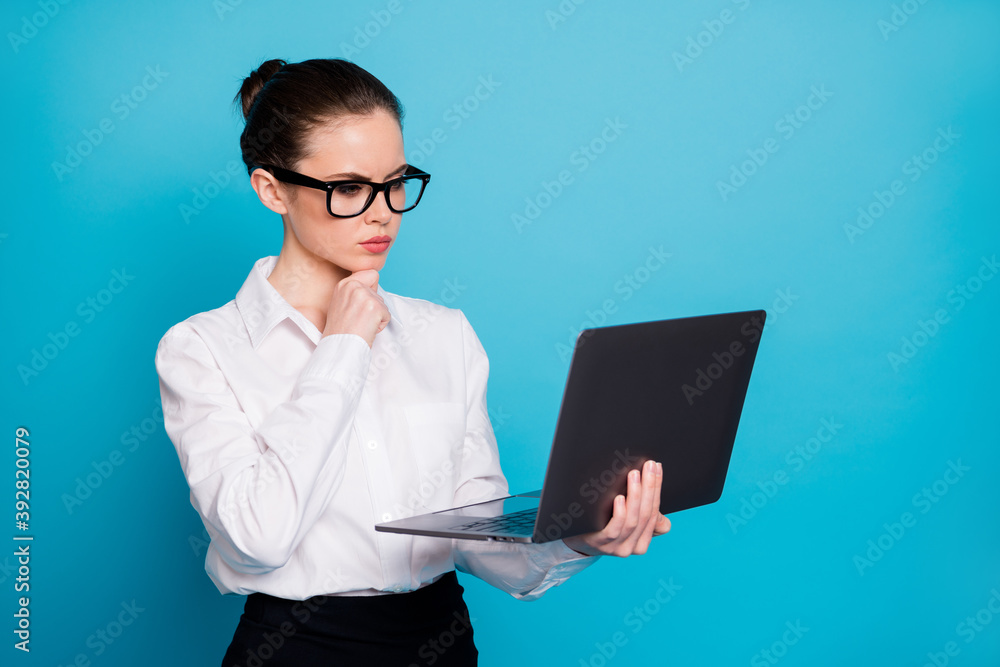 Canvas Prints close-up portrait of nice focused lady specialist holding in hands laptop browsing web reading isola