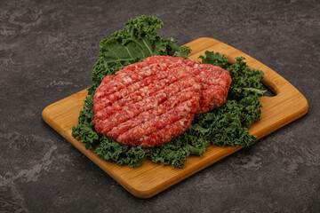 Raw beef burger cutlet for cooking