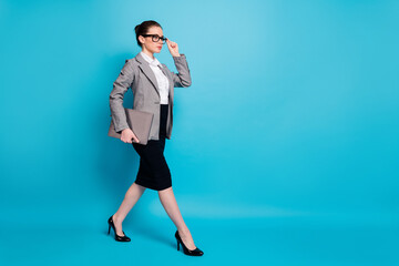 Full length body size view of nice attractive classy girl leader carrying laptop going isolated...