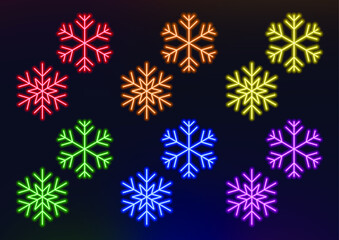 Set of neon snowflakes in different colors. Winter symbol. Shiny snow.