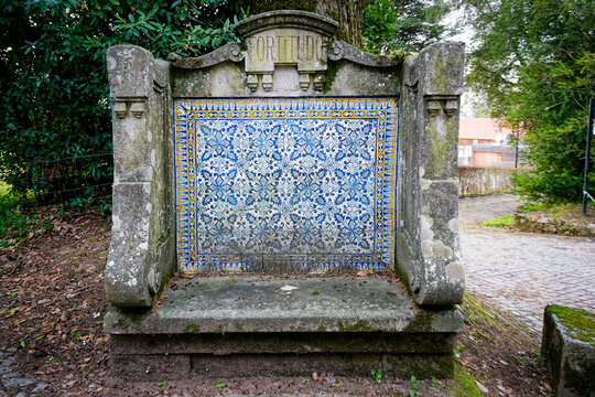 Stone bench decorated with ceramics