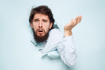 Dissatisfied man gestures with hand emotions career office work