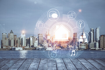 Double exposure of buildings hologram over cityscape background. Concept of smart city.