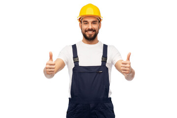 profession, construction and building - happy smiling male worker or builder in yellow helmet and...