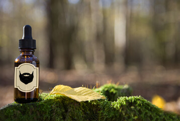 Natural beard Oil -  barbershop product photography. Beard oil in amber bottle.
