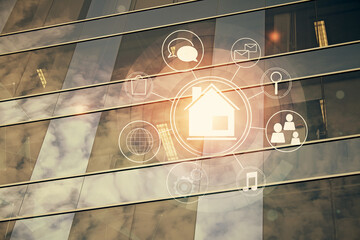 Double exposure of buildings hologram over cityscape background. Concept of smart city.