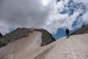 Male climber going through glacier Tetnuldi located in Caucasus mountains in Svaneti Georgia. The...