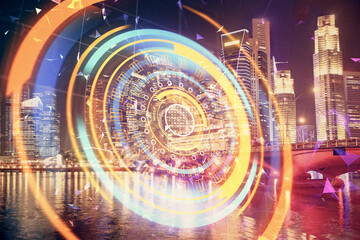 Double exposure of technology theme hologram and cityscape background. Concept of Hightech.