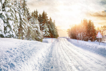 Winter scenery with emty roadon Vestvagoy island at sunset near Valberg