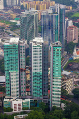 Aerial and elevated view over the modern buildings in cityscape of Kuala Lumpur, capital of Malaysia, Asia. View from the Kuala Lumpur tower (also known as Menara tower)