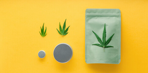 Craft green package with cannabis leaf and metal jars. Different sizes of Cannabis Packages, weed...