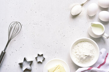 Bakiing background with ingredients for making cake or biscuit. Top view with copy space.