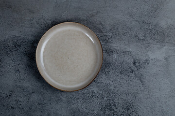 Vintage Rustic Plate on beautiful Stone textured background. Minimalist Style. Template for Poster Banner Cooking Baking Workshop Course