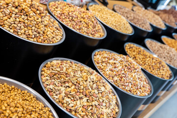 Pile of nuts and dried fruits on the market.