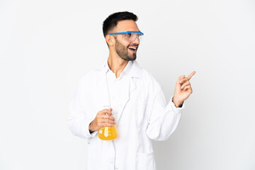 Obraz na płótnie Canvas Young scientific man isolated on white background intending to realizes the solution while lifting a finger up