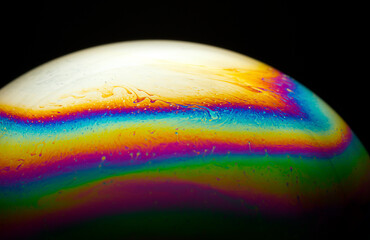 Rainbow abstract on a bubble's surface.