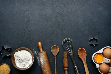 Culinary background with ingredients for baking : sugar, eggs, flour. Top view with copy space.