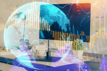 Financial graph colorful drawing and table with computer on background. Double exposure. Concept of...
