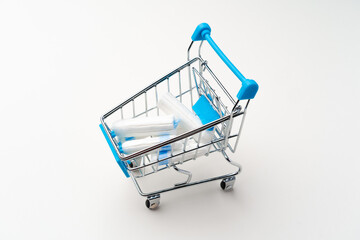 Shopping cart with medical tampons close up