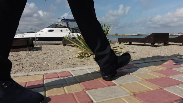 a man in a suit is walking