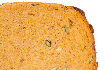 Part of bread slice with adding pumpkin seeds and juice