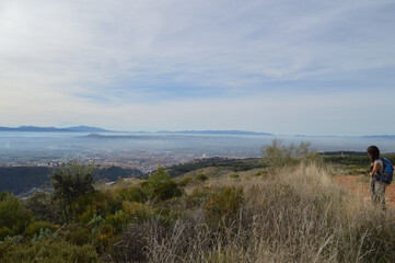 Fototapeta na wymiar Sierra Nevada and Granada seen from Dehesa del Generalife in Granada, Spain