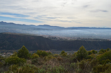 Sierra Nevada and Villages seen from Dehesa del Generalife in Granada, Spain