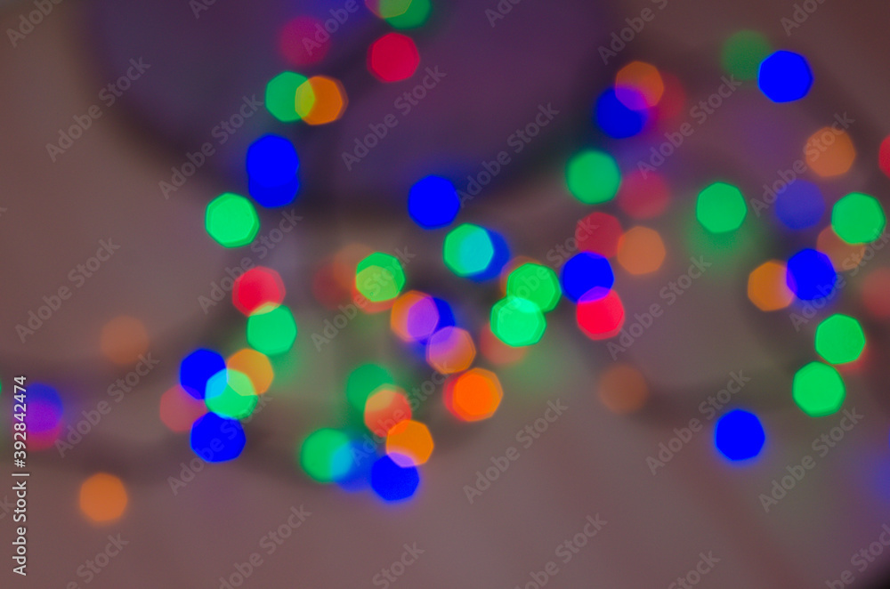 Wall mural christmas lights glowing garlands, background and texture of christmas lights