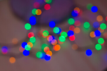 Christmas lights glowing garlands, background and texture of Christmas lights