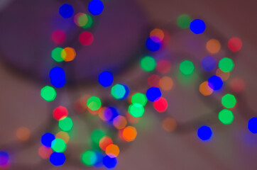 Christmas lights glowing garlands, background and texture of lights