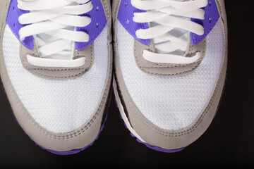 Detailed macro photo of a sports sneakers. Close-up of lacing.